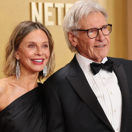 Calista Flockhart, left, and Harrison Ford attend the 32nd annual Actor Awards at Shrine Auditorium and Expo Hall on March 1 in Los Angeles.