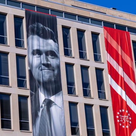 A banner with Charlie Kirk's image is seen on the outside of the Department of Education on March 1, 2026 in Washington, D.C.