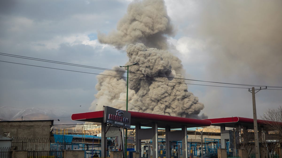 A plume of smoke rises after an explosion in Tehran, Iran, on March 2, 2026.