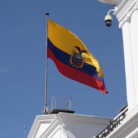 An Ecuadorean flag flutters at the Carondelet presidential palace in Quito on November 11, 2025.