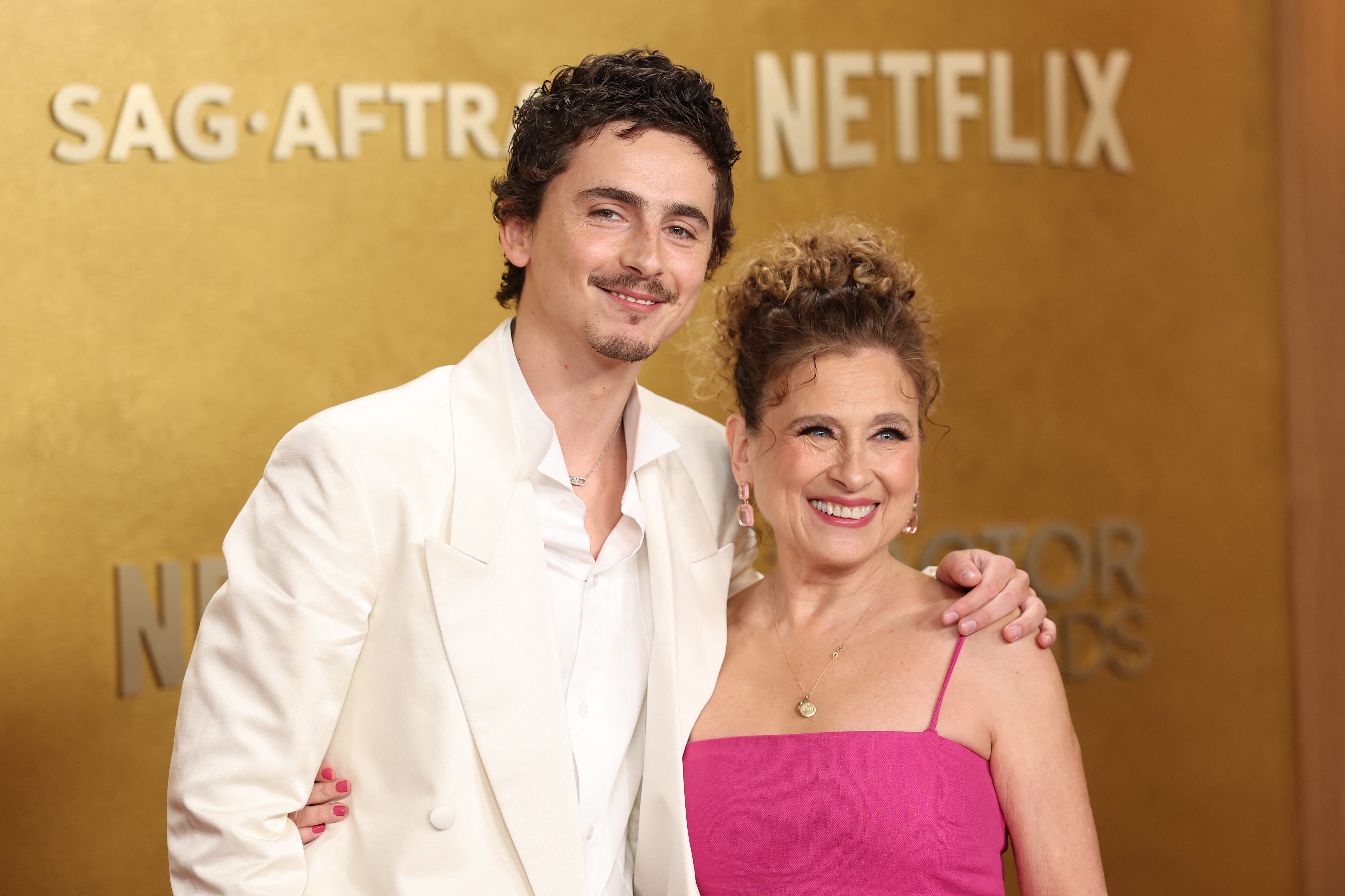 <p style="margin: 0px;">Timothee Chalamet, left, and his mother Nicole Flender </p>