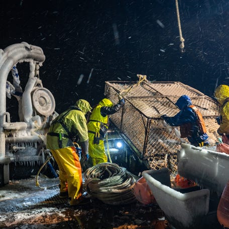 The crew from "Deadliest Catch" prepping ice cold pot to set.