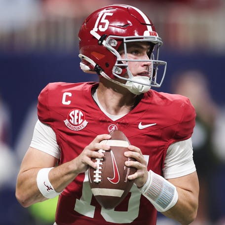 Dec 6, 2025; Atlanta, GA, USA; Alabama Crimson Tide quarterback Ty Simpson (15) looks to pass during the fourth quarter against the Georgia Bulldogs during the 2025 SEC Championship game at Mercedes-Benz Stadium. Mandatory Credit: Brett Davis-Imagn Images