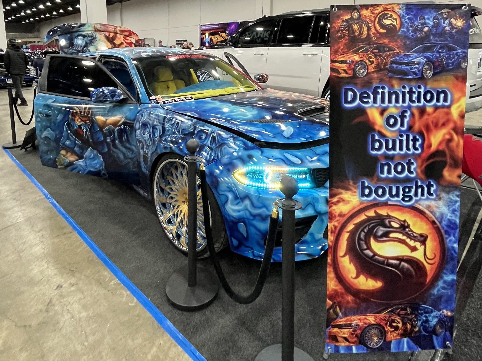 https://www.gannett-cdn.com/authoring/authoring-images/2026/03/05/PDTF/89006879007-mortal-kombat-themed-dodge-charger-scat-pack.jpg?auto=webp&crop=1919,1080,x0,y0&format=pjpg&width=1200