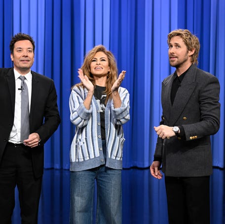 THE TONIGHT SHOW STARRING JIMMY FALLON -- Episode 2261 -- Pictured: (l-r) Host Jimmy Fallon, actress Eva Mendes, and actor Ryan Gosling during a surprise on Thursday, March 5, 2026 -- (Photo by: Todd Owyoung/NBC via Getty Images)