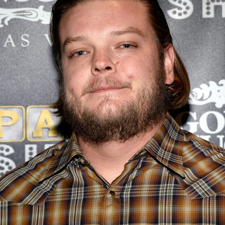 Corey "Big Hoss" Harrison arrives at the opening of "Pawn Shop Live!," a parody of History's "Pawn Stars" television series, at the Golden Nugget Hotel & Casino on Jan. 30, 2014, in Las Vegas.