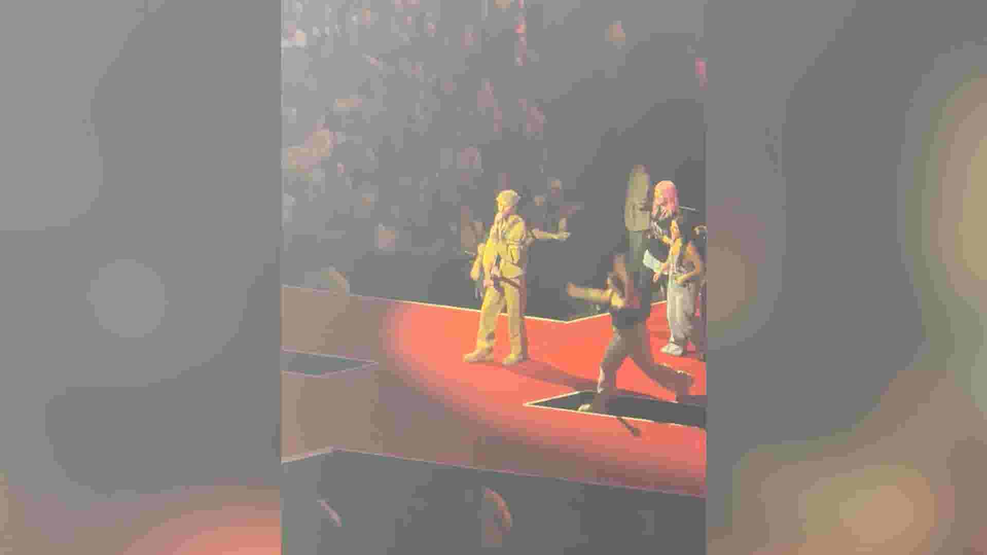 See Machine Gun Kelly fan receive gift from star after stage fall