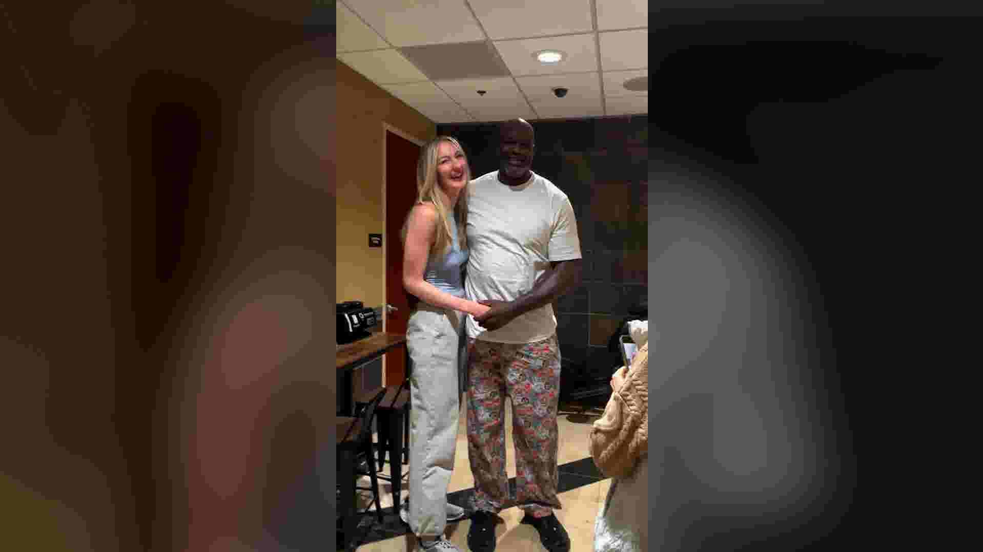 https://www.gannett-cdn.com/authoring/authoring-images/2026/03/06/USAT/89024530007-trnd-tallest-model-meets-shaq.jpg?crop=1918,1078,x0,y0&quality=10