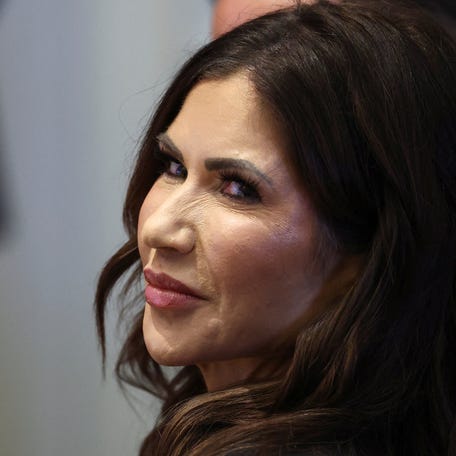 Kristi Noem reacts as she attends the "Shield of the Americas" Summit in Miami, Florida, U.S., March 7, 2026. REUTERS/Kevin Lamarque