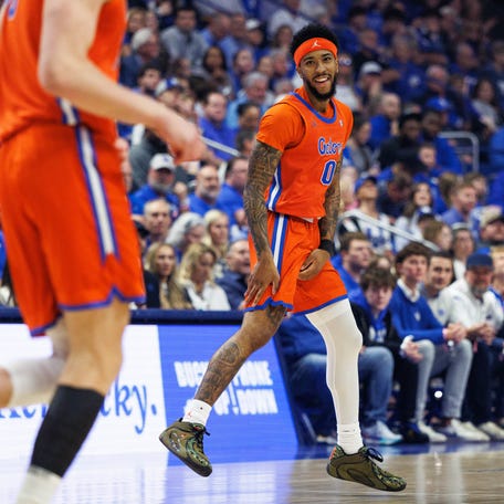 Florida Gators guard Boogie Fland (0) celebrates after scoring a three point basket during the first half against the Kentucky Wildcats at Rupp Arena at Central Bank Center.