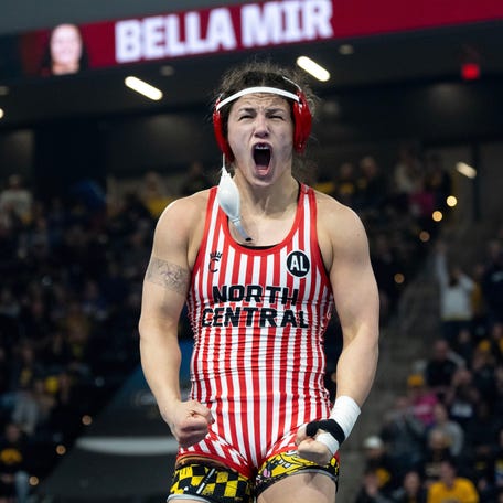 North Central's Bella Mir celebrates after defeating Iowa's Reese Larramendy March 7, 2026 in a 145-pound match at the NCAA Women's Wrestling Championship at Xtream Arena in Coralville, Iowa.