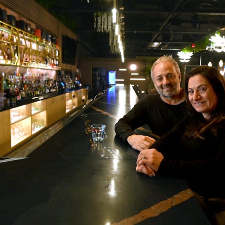Whiskey Lounge owners Roger and Joanna Bachour in their new bar on Shrewsbury Street.