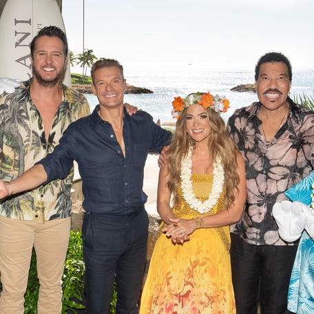 "American Idol" judges Luke Bryan, Carrie Underwood and Lionel Richie pose with Ryan Seacret and Mickey and Minnie Mouse at the Season 24 premiere watch party.