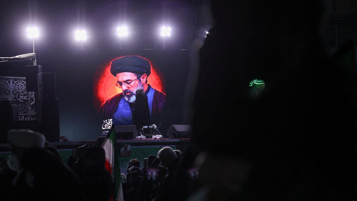 A picture of Iran's new supreme leader, Mojtaba Khamenei, is displayed on a screen in Tehran on March 9, 2026.