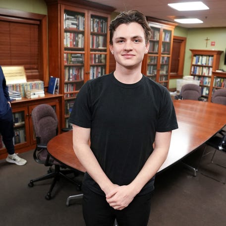 Sophomore Michael Leary, 19, poses for pictures at Saint Anselm College, after being interviewed as part of a panel of students about their views on the Trump administration, in Manchester, New Hampshire, on March 2, 2026. Photo