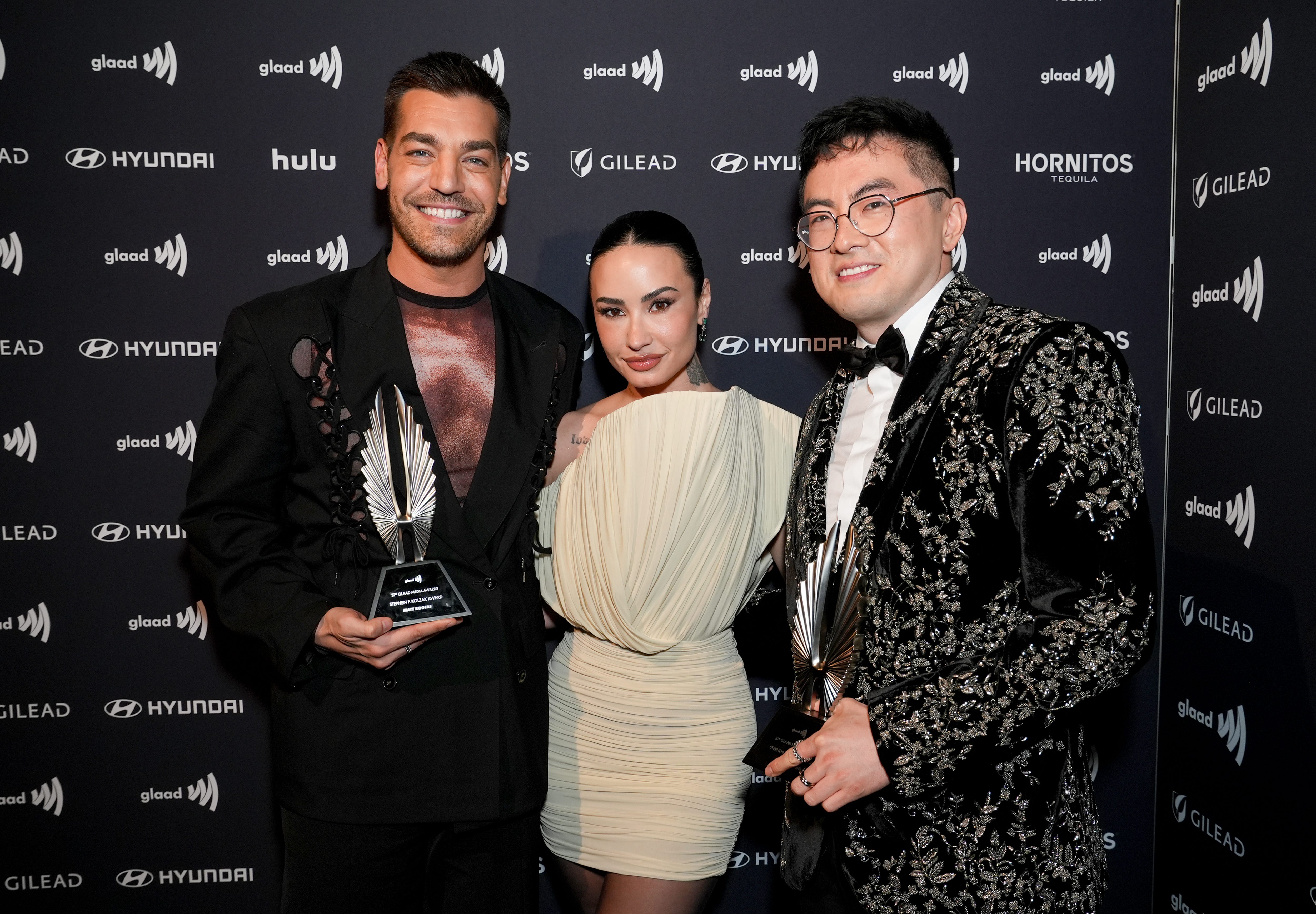 <p style="margin: 0px;">From left, Matt Rogers, Demi Lovato, and Bowen Yang </p>