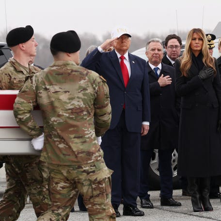 President Donald Trump and first lady Melania Trump attend a ceremony in Dover, Delaware, on March 7, 2026, of U.S. military members returning the remains of service members killed amid the U.S.-Israeli war with Iran.