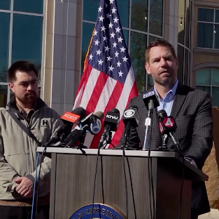 Rep. Eric Swalwell holds a press conference after a family is deported and a young boy is separated from his hearing aid.