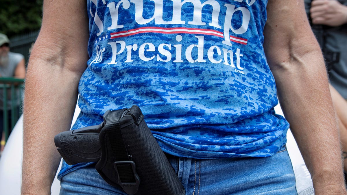 A woman in a Trump for President shirt attends a pro-gun rally in Richmond, Virginia, on July 4, 2020.