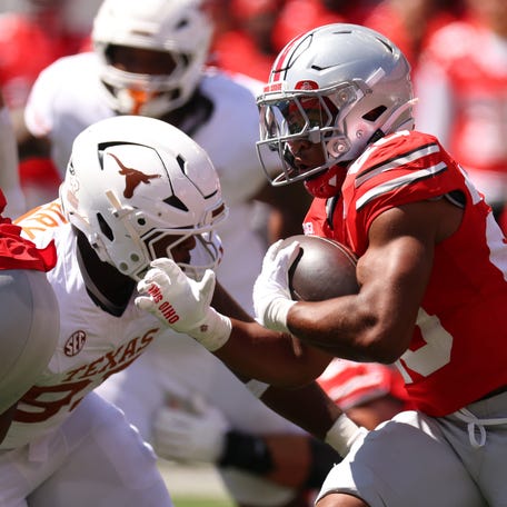 COLUMBUS, OHIO - AUGUST 30: James Peoples #20 of the Ohio State Buckeyes during a first half run while playing the Texas Longhorns at Ohio Stadium on August 30, 2025 in Columbus, Ohio. (Photo by Gregory Shamus/Getty Images)