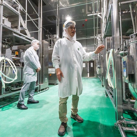 Senior operations manager Justin Lee gives a tour at Nasoya in Ayer March 10.