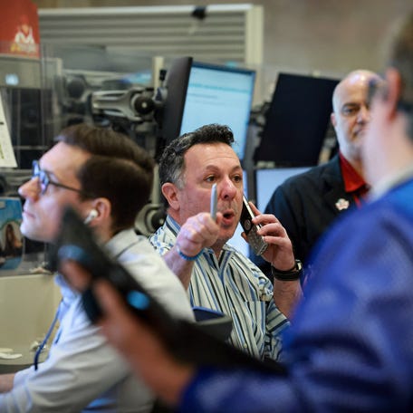 Futures-options traders work on the floor at the New York Stock Exchange's NYSE American (AMEX) in New York City, U.S., March 9, 2026.