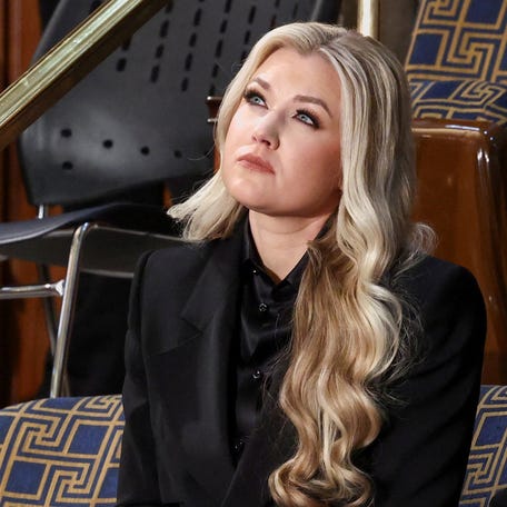 Erika Kirk, the widow of slain conservative activist Charlie Kirk, and U.S. President Donald Trump's special guest, looks up as she arrives for U.S. President Donald Trump's State of the Union address on Feb. 24, 2026.