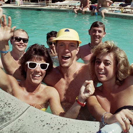 College students from the East Coast enjoy 95 degree temperatures during Spring Break poolside, March 26, 1986 in Palm Springs, Calif.