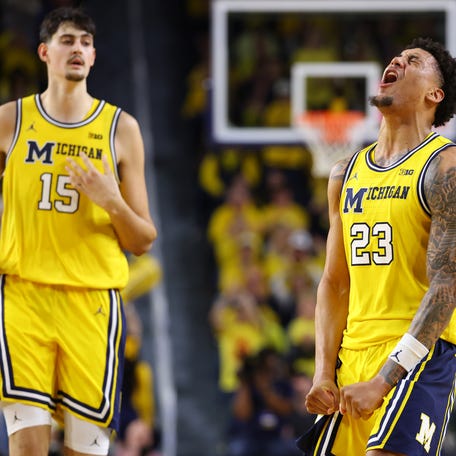 ANN ARBOR, MICHIGAN - MARCH 08: Yaxel Lendeborg #23 of the Michigan Wolverines reacts after a second half three point basket while playing the Michigan State Spartans at Crisler Arena on March 08, 2026 in Ann Arbor, Michigan. (Photo by Gregory Shamus/Getty Images)