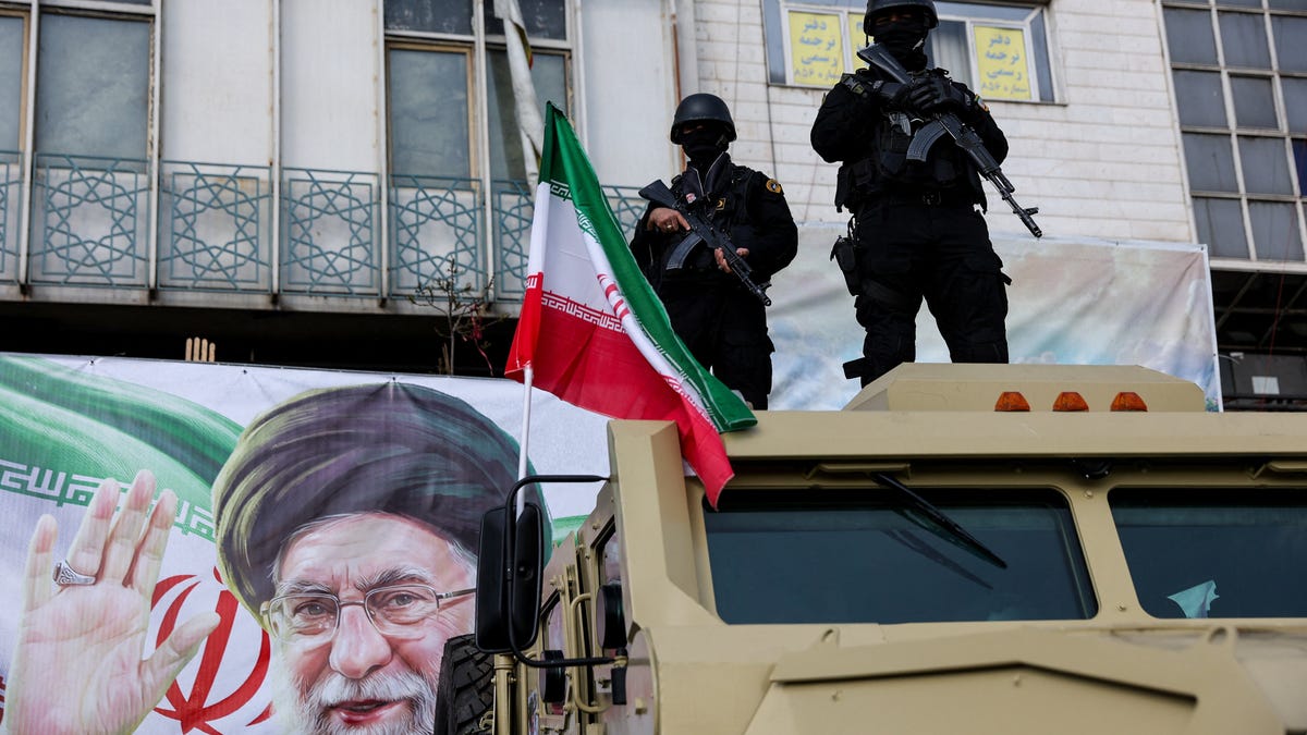 Members of Iranian security forces stand guard during a gathering to support Iran's new supreme leader Mojtaba Khamenei, amid the U.S.-Israeli conflict with Iran, in Tehran, Iran, March 9, 2026.