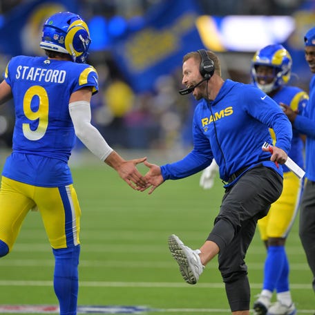 Jan 4, 2026; Inglewood, California, USA; Los Angeles Rams head coach Sean McVay reacts with quarterback Matthew Stafford (9) after a touchdown against the Arizona Cardinals during the second half at SoFi Stadium. Mandatory Credit: Jayne Kamin-Oncea-Imagn Images