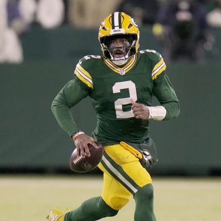 Green Bay Packers quarterback Malik Willis (2) runs the ball during the fourth quarter of their game Saturday, December 27, 2025 at Lambeau Field in Green Bay, Wisconsin. The Baltimore Ravens beat the Green Bay Packers 41-24.