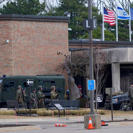 Police from various agencies come out Temple Israel in West Bloomfield on Thursday, March. 12, 2026.