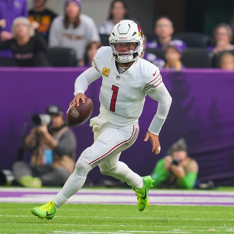 Dec 1, 2024; Minneapolis, Minnesota, USA; Arizona Cardinals quarterback Kyler Murray (1) scrambles against the Minnesota Vikings in the second quarter at U.S. Bank Stadium. Mandatory Credit: Brad Rempel-Imagn Images