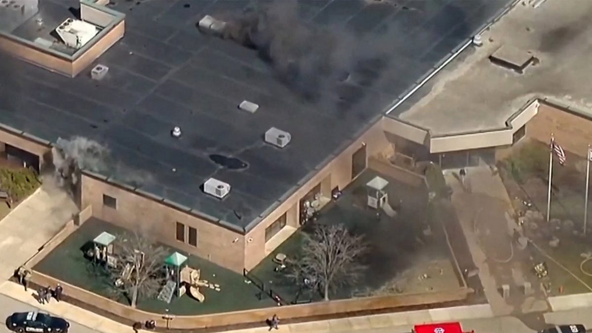 Michigan synagogue shooting suspect dead, see police response