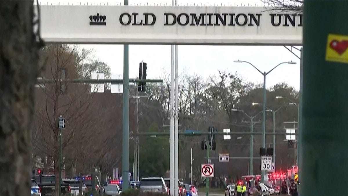 Police block an entrance road after a gunman opened fire at Old Dominion University in Norfolk, U.S., March 12, 2026, in a still image from video.