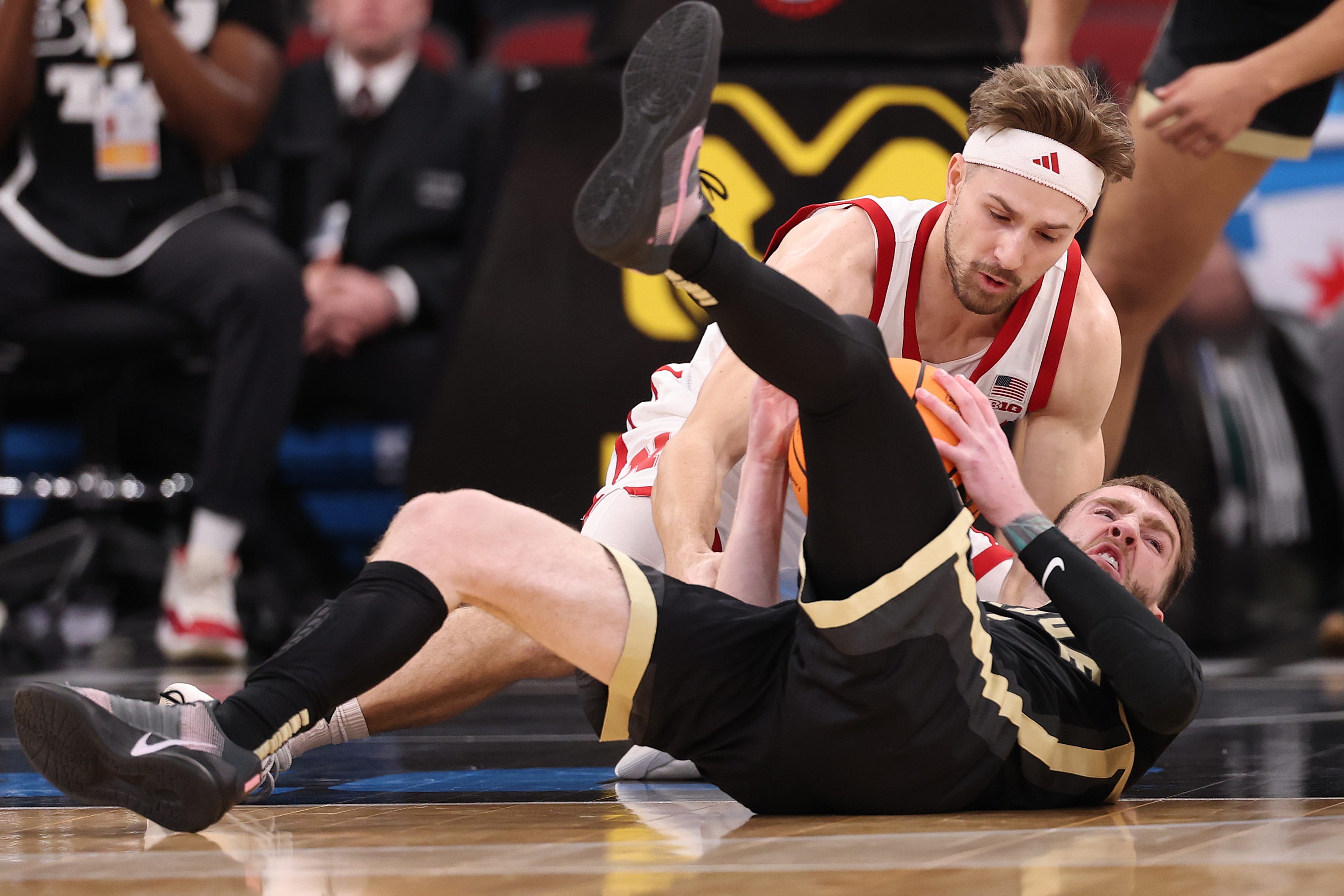 Purdue and Nebraska players competing on the court during the Big Ten Tournament