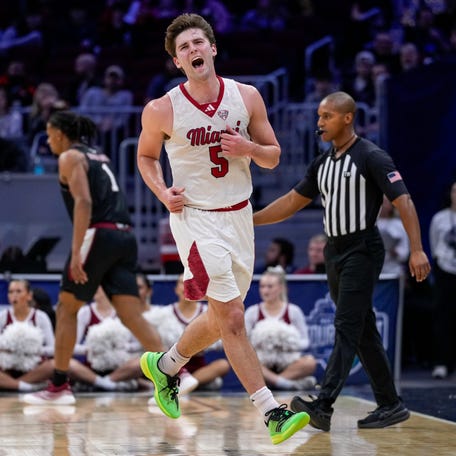 Miami RedHawks guard Peter Suder (5) reacts to a turnover in the second half of Mid-American Conference Tournament first round game between the Miami RedHawks and the UMass Minutemen at Rocket Arena in Cleveland on Thursday, March 12, 2026.