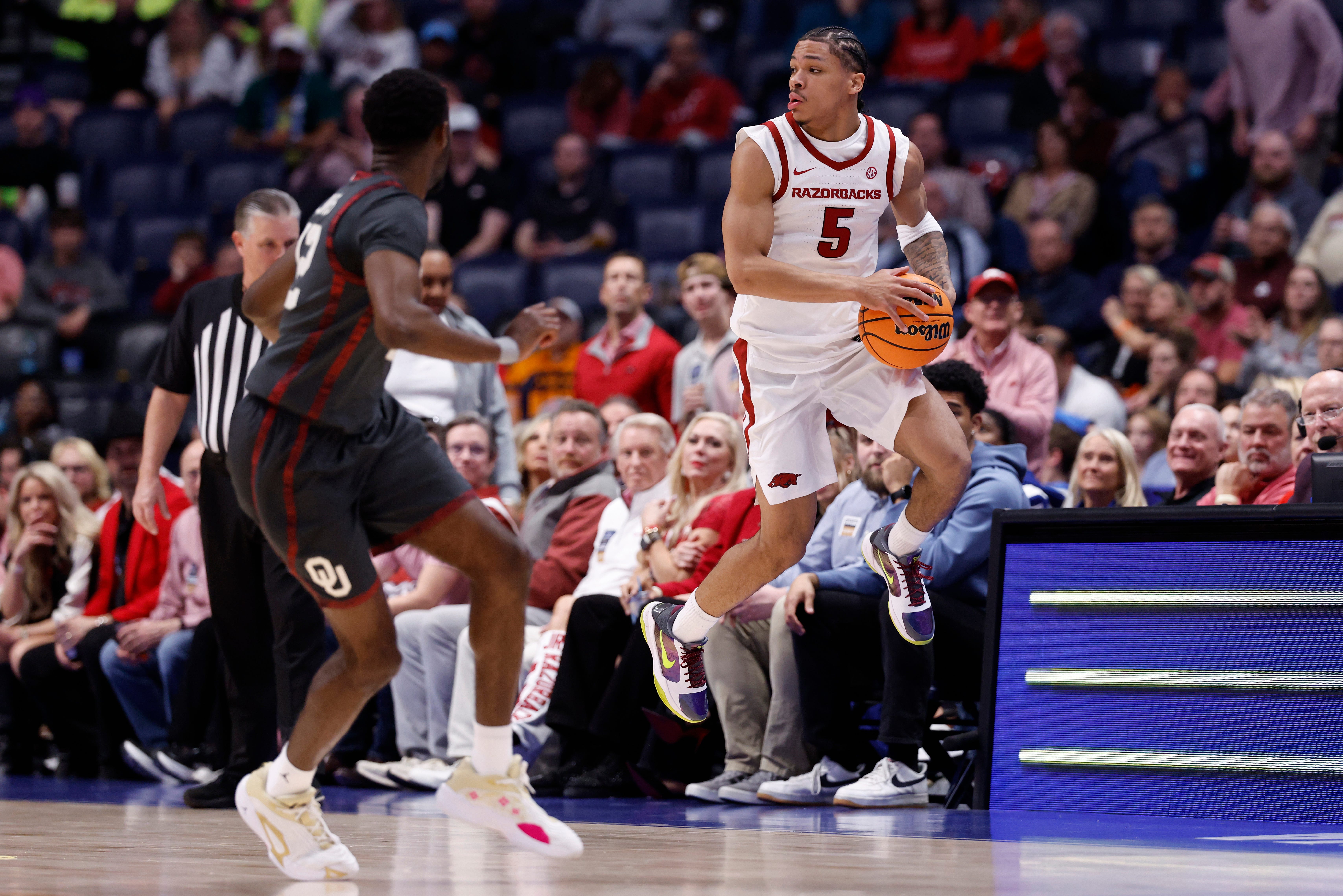 John Calipari coaching Arkansas against Oklahoma