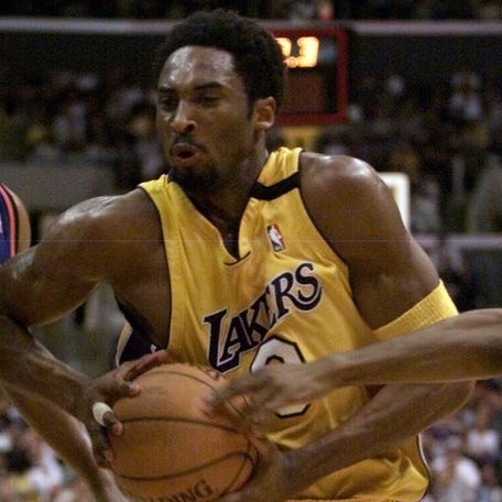 Kobe Bryant drives to the hoop during the Los Angeles Lakers' win over the Knicks on April 2, 2000.