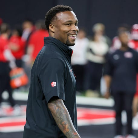 LAS VEGAS, NEVADA - NOVEMBER 30: Offensive coordinator and quarterbacks coach Brennan Marion of the UNLV Rebels looks on during warmups before a game against the Nevada Wolf Pack at Allegiant Stadium on November 30, 2024 in Las Vegas, Nevada. The Rebels defeated the Wolf Pack 38-14. (Photo by Ethan Miller/Getty Images)