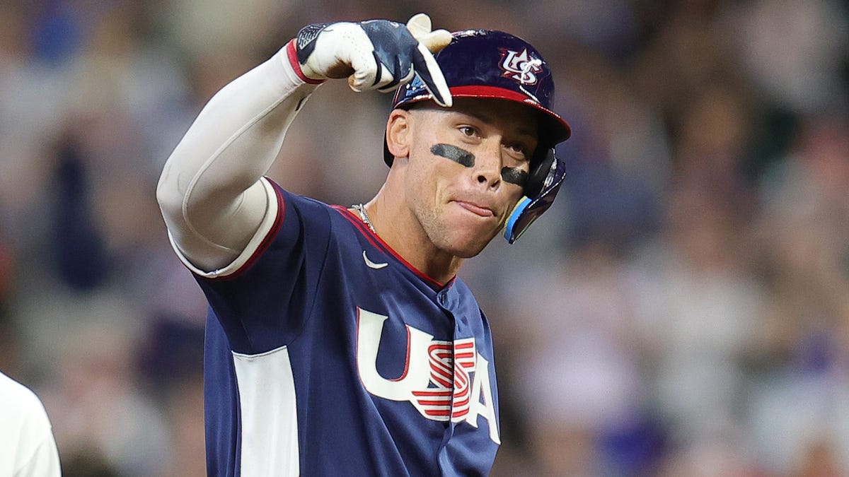 HOUSTON, TEXAS - MARCH 13: Aaron Judge #99 of Team United States celebrates his line drive during the first inning against Team Canada at Daikin Park on March 13, 2026 in Houston, Texas. (Photo by Alex Slitz/Getty Images)