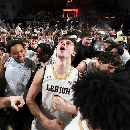 Mar 11, 2026; Bethlehem, Pennsylvania, USA; Lehigh Mountain Hawks forward Edouard Benoit (5) reacts after defeating the Boston University Terriers in the Patriot League Championship at Stabler Arena. Mandatory Credit: James Lang-Imagn Images