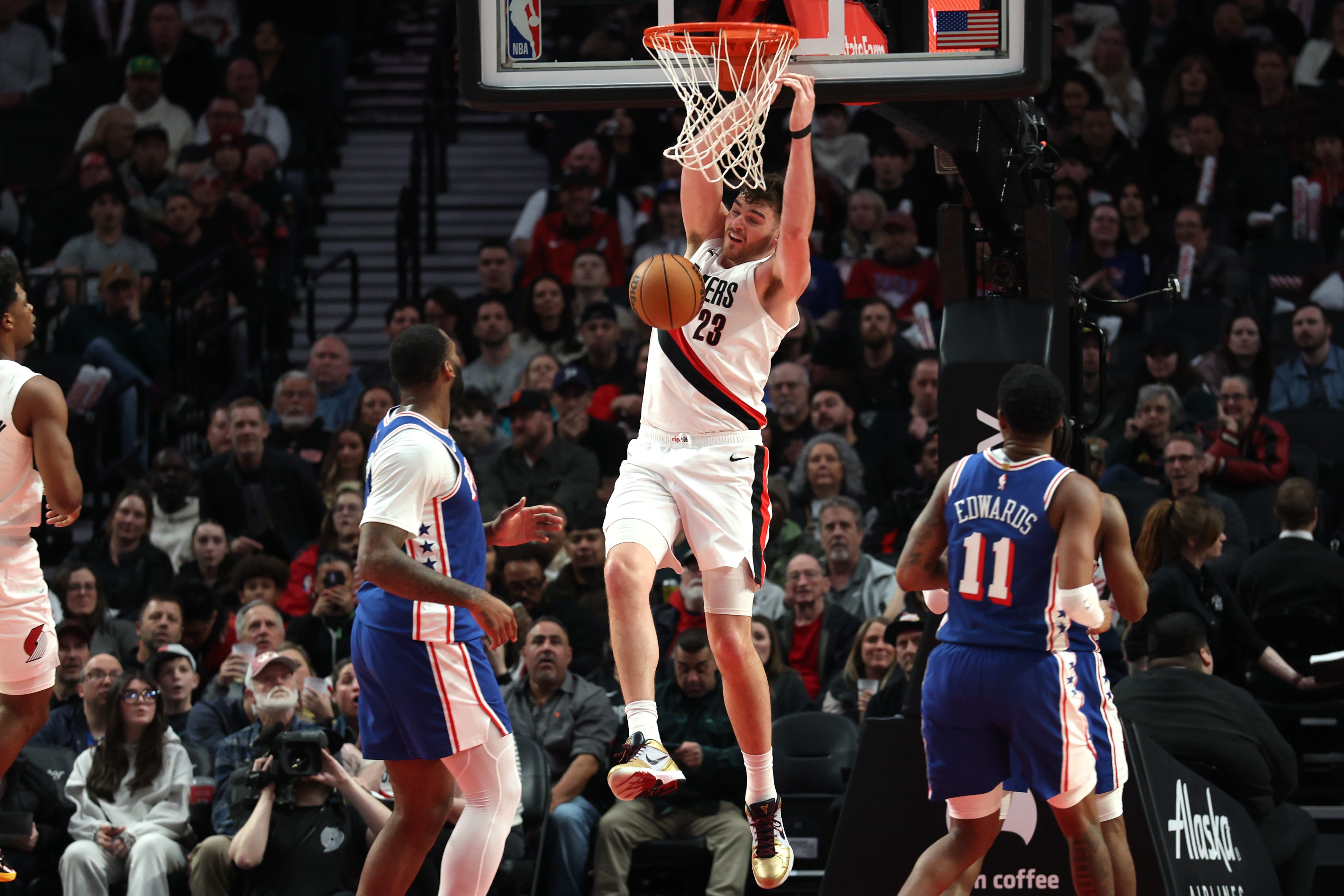 NBA game action between Portland and Philadelphia