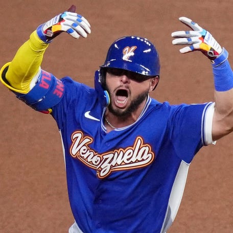 MIAMI, FLORIDA - MARCH 14: Wilyer Abreu #16 of Team Venezuela rounds the bases after hitting a home run during the sixth inning against Team Japan during the 2026 World Baseball Classic at loanDepot park on March 14, 2026 in Miami, Florida. (Photo by Rich Storry/Getty Images)