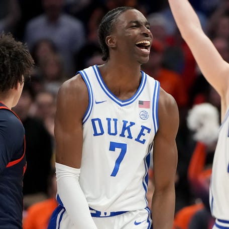 Duke guard Dame Sarr (7) celebrates after a play against Virginia during the 2026 ACC tournament championship game at Spectrum Center in Charlotte, N.C.