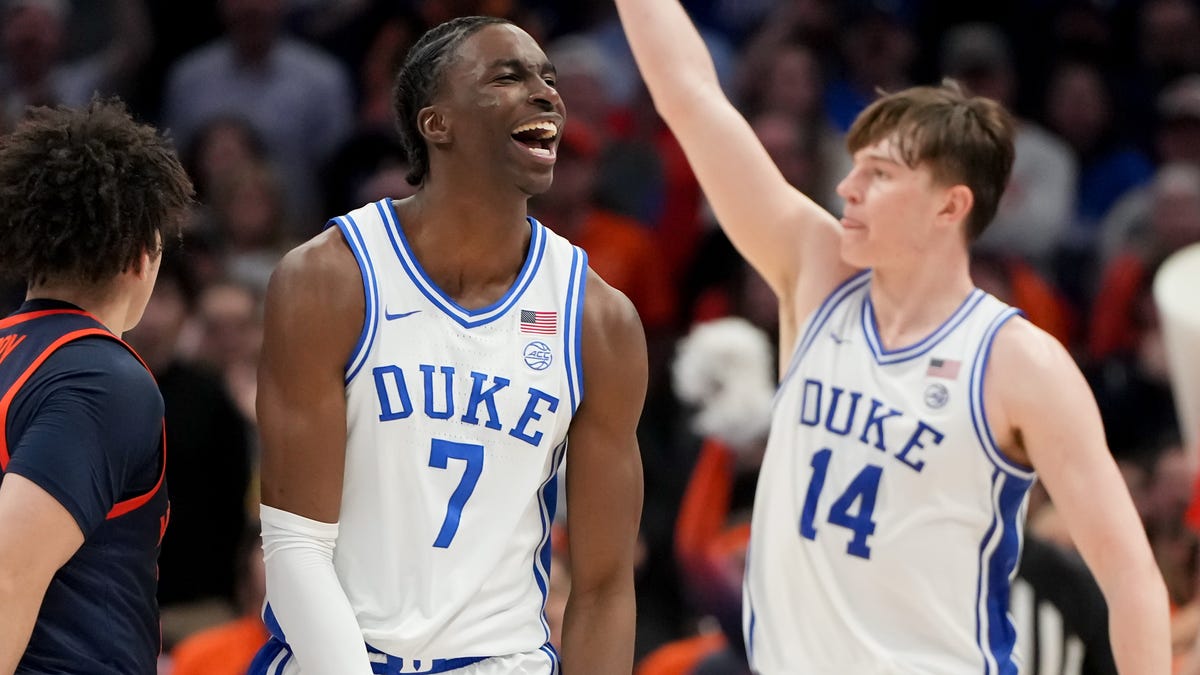 Duke guard Dame Sarr (7) celebrates after a play against Virginia during the 2026 ACC tournament championship game at Spectrum Center in Charlotte, N.C.