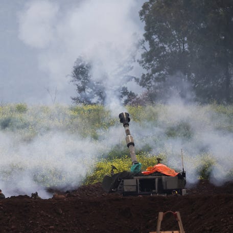 Israeli soldiers use artillery on the Israeli side of the Israel-Lebanon border, amid escalation between Hezbollah and Israel, and amid the U.S.-Israeli conflict with Iran, in northern Israel, March 15, 2026.
