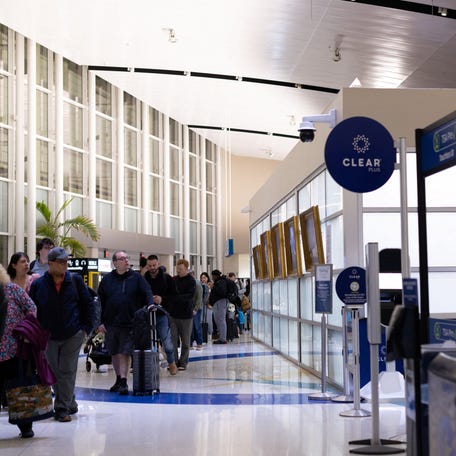Travellers wait in Transportation Security Administration screening lines at the San Antonio International Airport in San Antonio, Texas, U.S., March 14, 2026. REUTERS/Kaylee Greenlee
