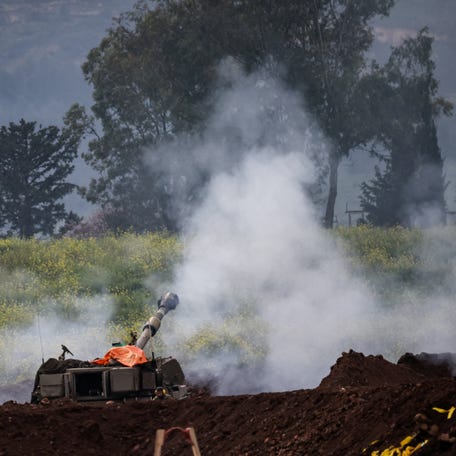 Israeli soldiers use an artillery unit, amid escalation between Hezbollah and Israel, and amid the U.S.-Israeli conflict with Iran, on the Israeli side of the Israel-Lebanon border, March 15, 2026. REUTERS/Shir Torem